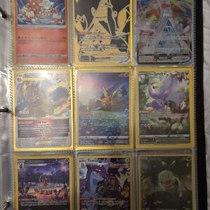 2 binder pages (18 total mint condition pokemon TCG cards) various sets